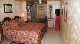 Kingsized Bed in Wood Room 1st Level